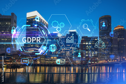 City view panorama of Boston Harbour and Seaport Blvd at night time  Massachusetts. Building exteriors of financial downtown. GDPR hologram is data protection regulation  privacy for all individuals