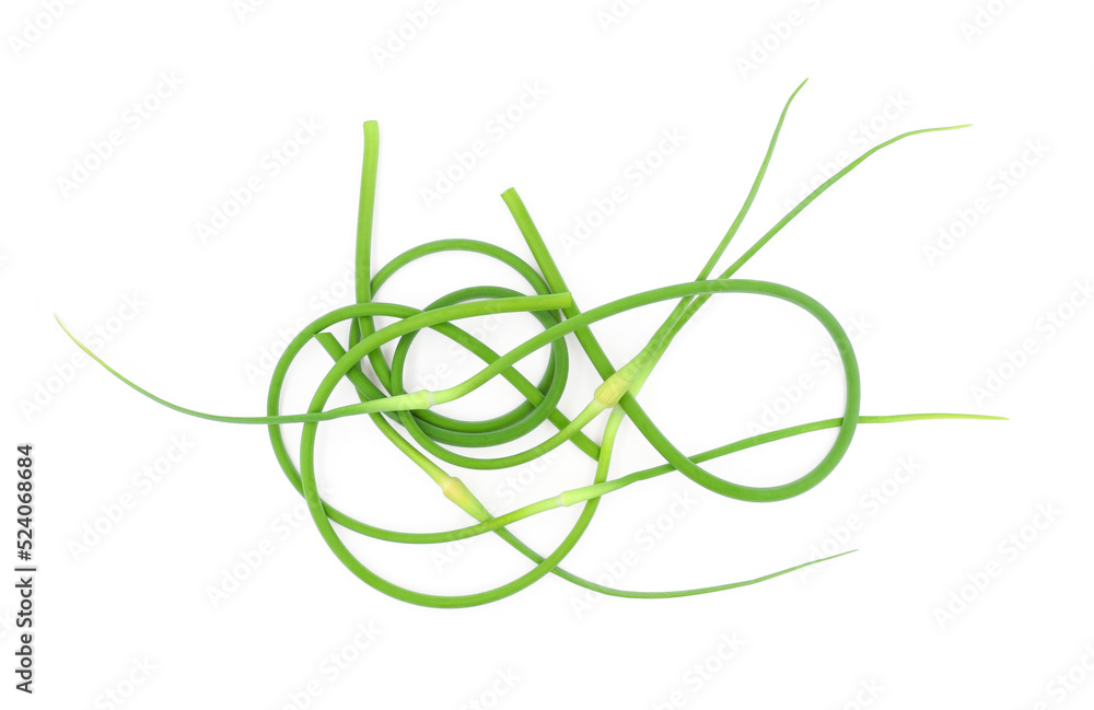 Fresh garlic arrows isolated on white top view. Food ingredient. Fresh garlic arrows isolated on white top view. Food ingredient.