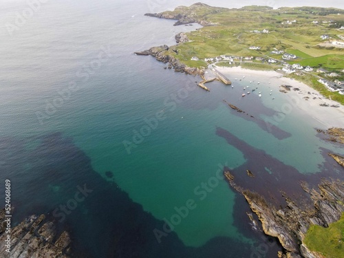 Beautiful aerial view of the Portnablagh Pier in Dunfanaghy Donegal Ireland photo