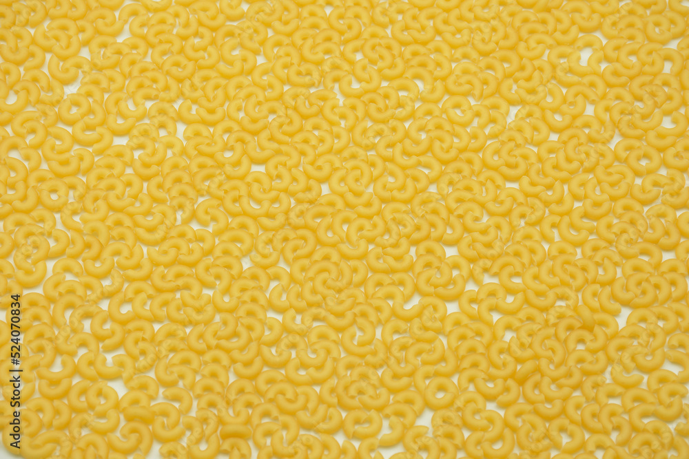 Italian pasta closeup picture.Raw pasta .Top view of Italian cuisine ingredient. Italian pasta closeup picture.Raw pasta .Top view of Italian cuisine ingredient.