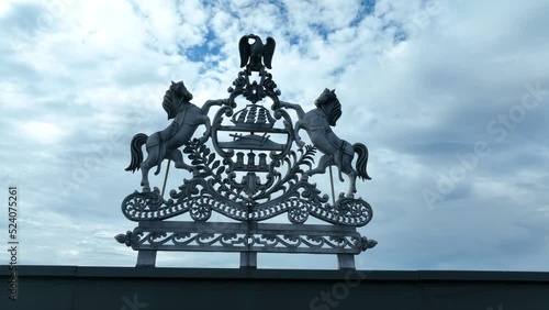 Pennsylvania seal on top of a building. Symbolic state imagery. PA government theme. photo