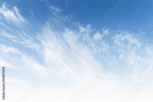 Beautiful fluffy abstract clouds on cyan and white sky background gradient, blue heaven backdrop in morning in summer. Light cloud in a good weather day. Natural landscape environment in the air