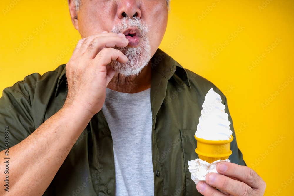 elderly men holding icecream, old man problem with Teeth, Desserts for elderly, Portrait Asian