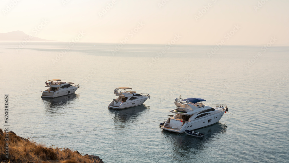 Luxury yachts in Aspat Bay, front view Luxury yachts in Aspat Bay, front view