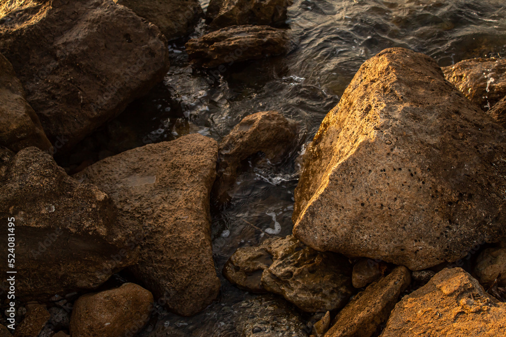 Naklejka premium Le Castella, Calabria, Italy, rocks on the beach