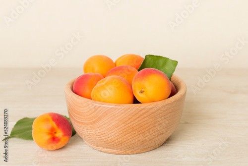 Fototapeta Naklejka Na Ścianę i Meble -  Composition with ripe apricots on wooden table