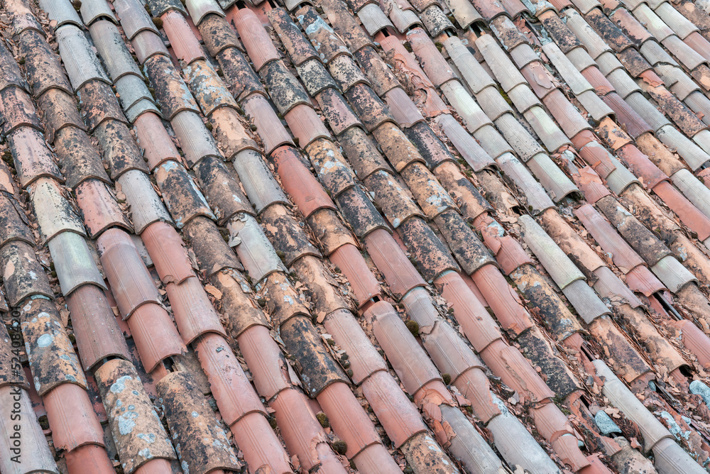 Roof with a old terracotta clay tiles Italy, Europe Roof with a old terracotta clay tiles Italy, Europe