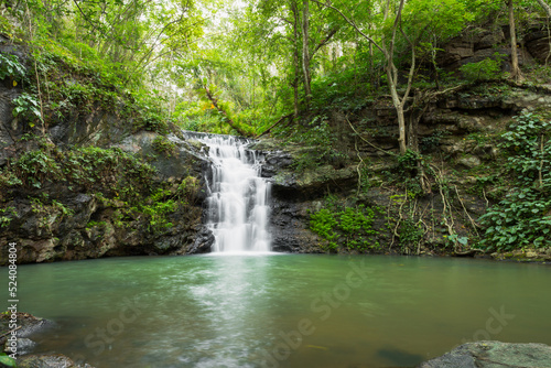 Fototapeta Naklejka Na Ścianę i Meble -  Ton Rak Sai Waterfall is in Namtok Sam Lan National Park ,Saraburi Thailand	