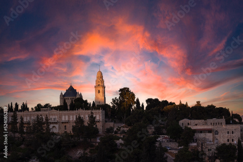 Colorful sunset view of Mount Zion and the St. James Cathedral in the Armenian Quarter of Jerusalem's Old City.