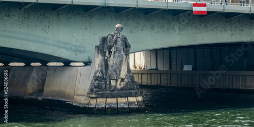 The Zouave statue, used as an informal flood marker for the level of the River Seine in Paris on the Pont de l'Alma bridge photo