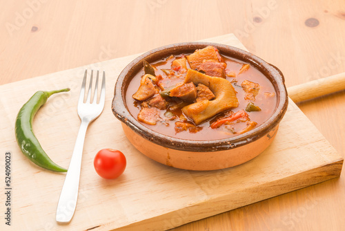 Pork or veal snout stewed in a clay pot, typical Spanish food.