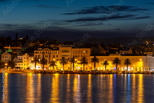 Evening city of Split in Croatia  reflection of the lights of the night city.