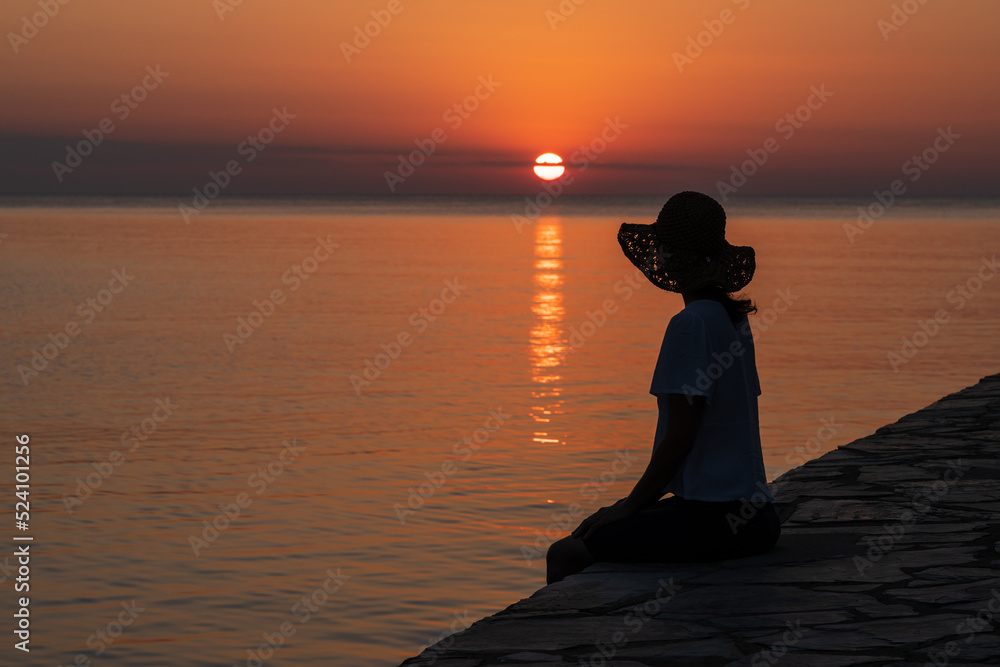 Sitting there watching the sunrise.