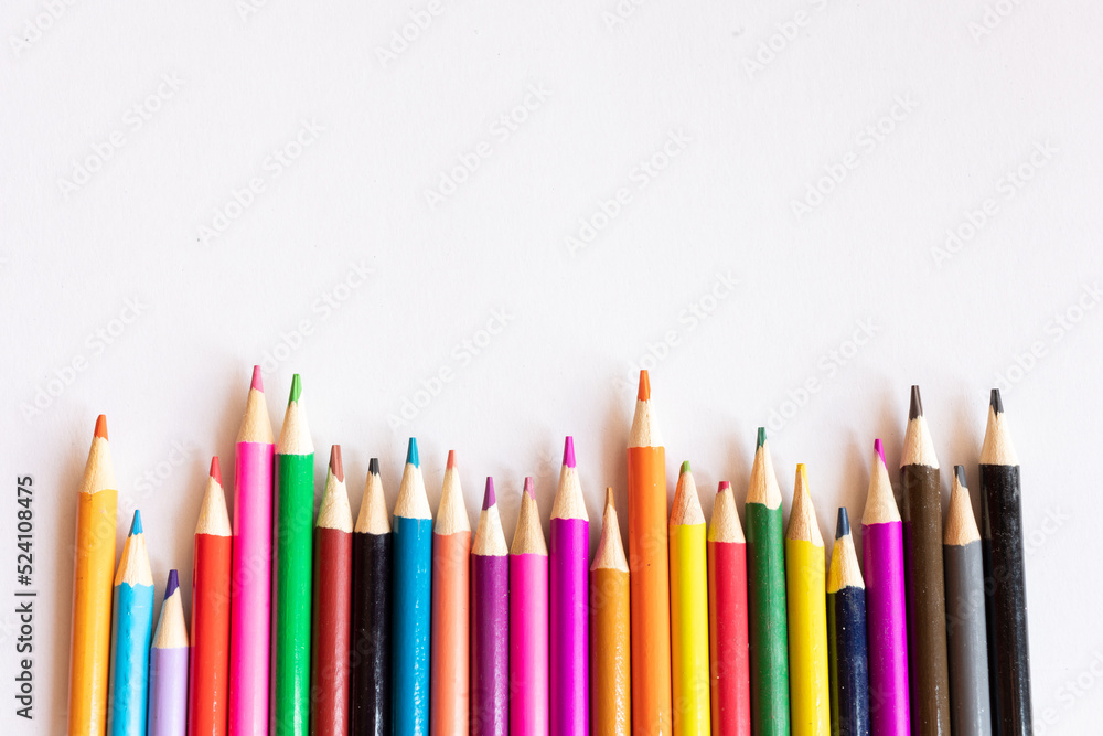 Colorful Wooden Crayons on white background Colorful Wooden Crayons on white background