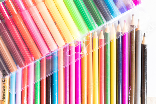 Colorful Wooden Crayons and flomasters on white background stock photo
