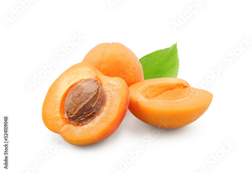 Fresh ripe apricots whole and halves isolated on white background	