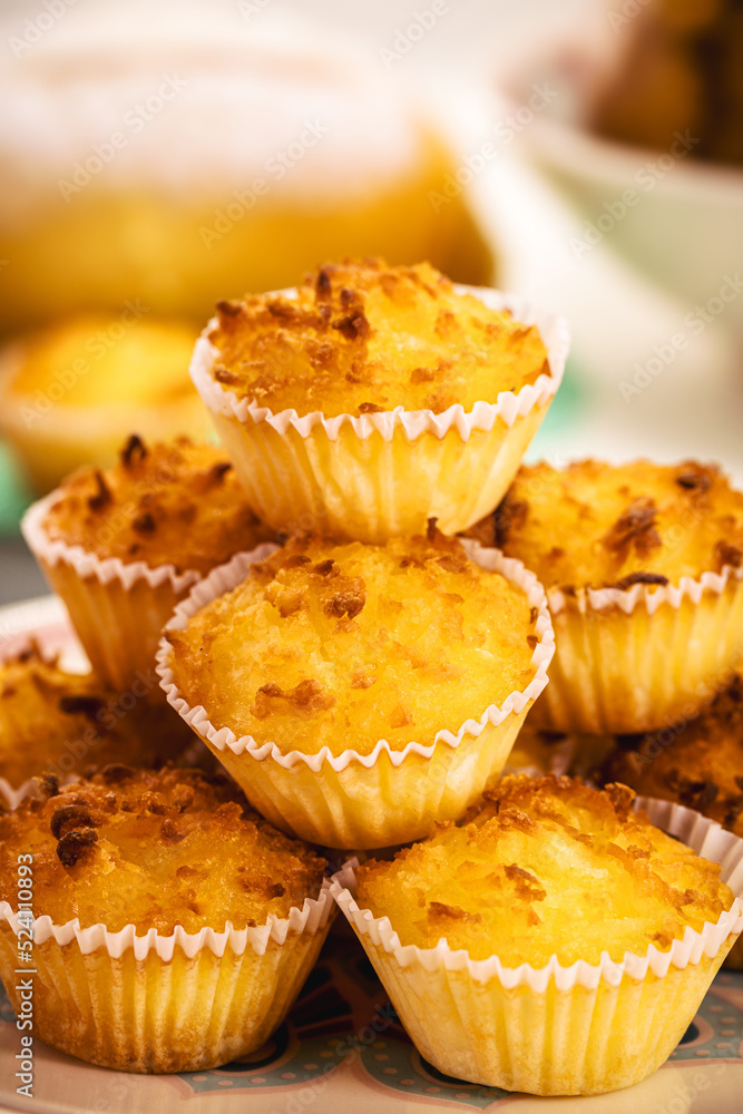 Typical sweet from Brazil and Portugal, called queijadinha or queijada. Homemade dessert, pastry from bakery or traditional confectionery Typical sweet from Brazil and Portugal, called queijadinha or queijada. Homemade dessert, pastry from bakery or traditional confectionery