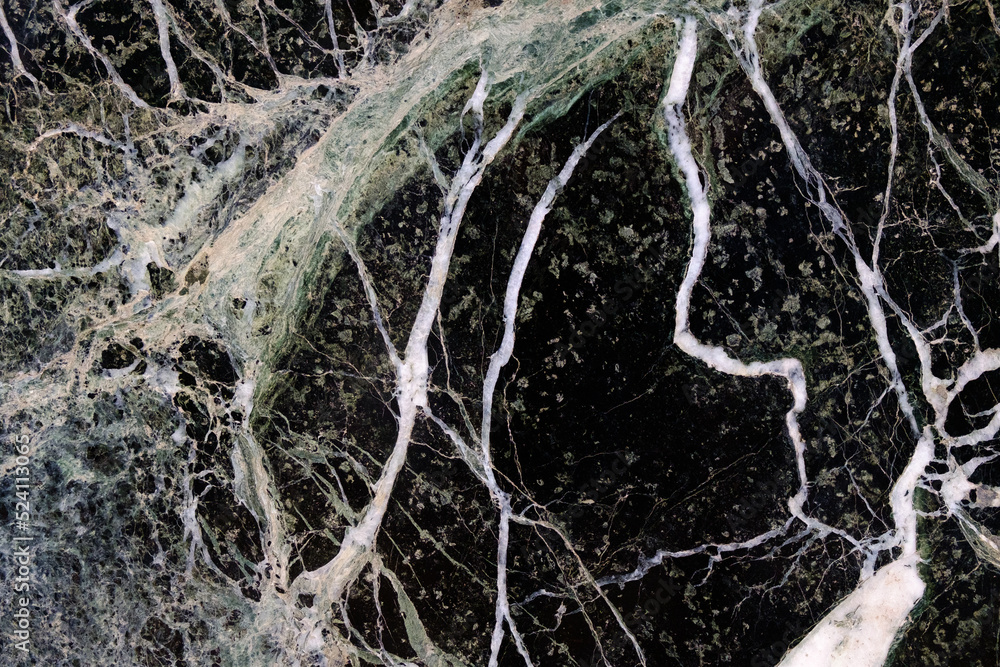 black marble with white veins. beautiful stone texture