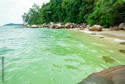 Rocky seaside scenery at Besar Island or Pulau Besar in Mersing, Johor, Malaysia