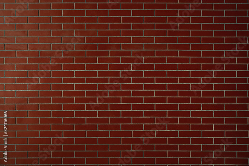 Brick wall background. Pattern brown color design decorative uneven cracked real stone wall surface with cement. Dry brick wall as seamless background
