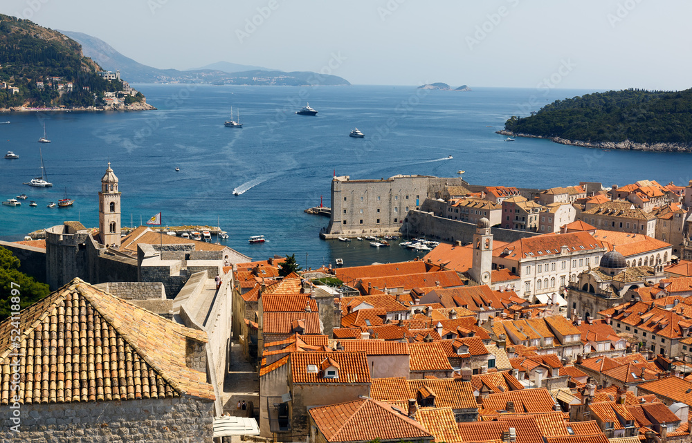 Port of Dubrovnik from the old city walls in a sunny day