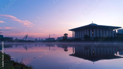 4K Time lapse Footage of Tuanku Mizan Mosque with Putrajaya administration background view during beautiful sunrise