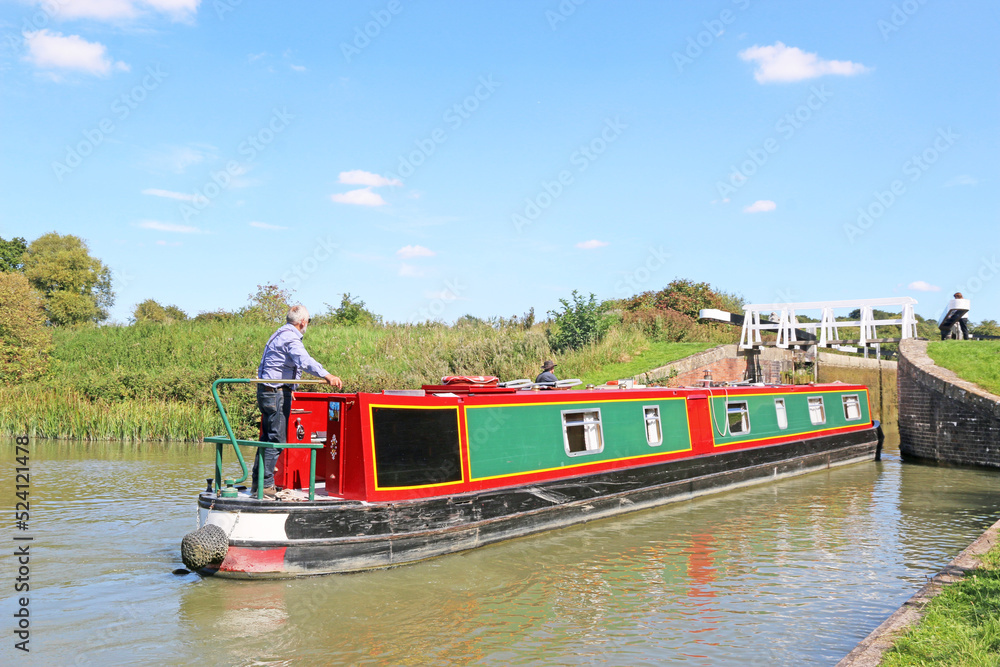 Naklejka premium Narrow boats in the Caen Hill canal locks, Devizes, England