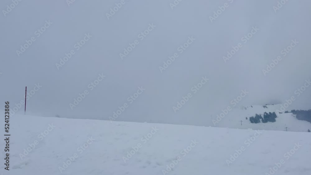 Heavy snowfall at the top of ski track on Alpine resort Heavy snowfall at the top of ski track on Alpine resort