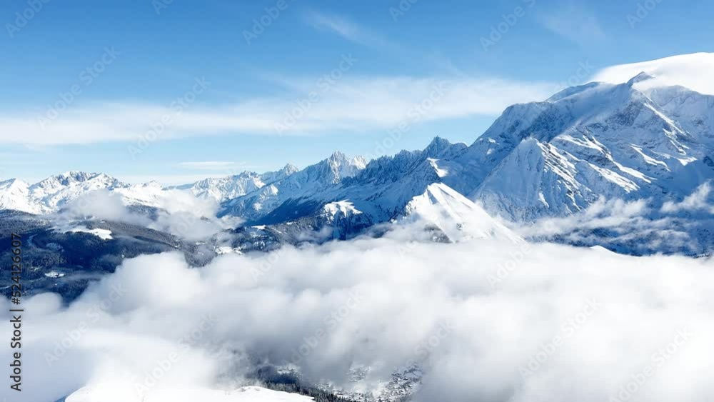 Panorama above clouds of Alps mountains and Mont Blanc massif Panorama above clouds of Alps mountains and Mont Blanc massif
