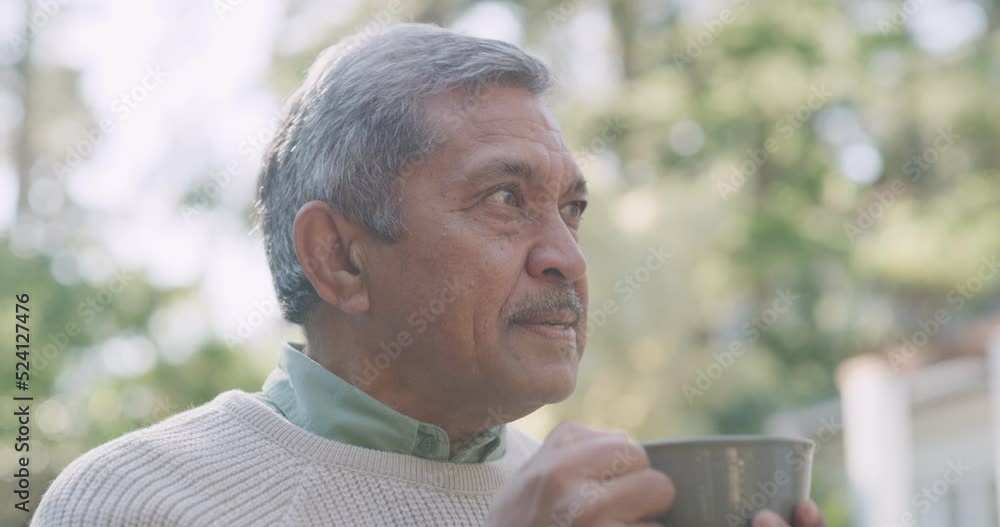 Carefree senior man drinking coffee in nature, relaxing with tea in a garden and looking at the view in a park. Relaxed, retired and mature male enjoying a day outside in summer and thinking Carefree senior man drinking coffee in nature, relaxing with tea in a garden and looking at the view in a park. Relaxed, retired and mature male enjoying a day outside in summer and thinking