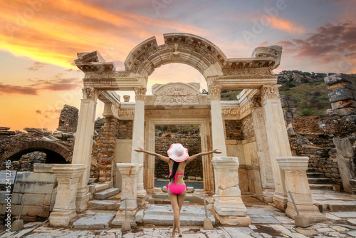 Canvas Print ephesus tourism destination hadrian gate and a tourist girl