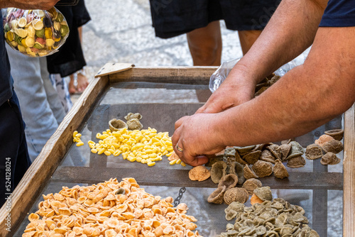 Typical italian pasta orecchiette of different color and freshly handmade in Bari Puglia Italy