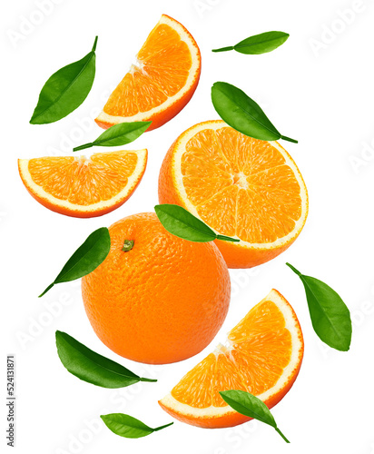 flying oranges with slices and green leaves isolated on white background. clipping path