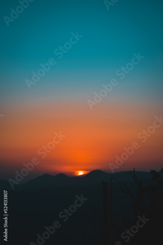 sunset in the mountains golden hour teal and orange travel adventure pakistan 