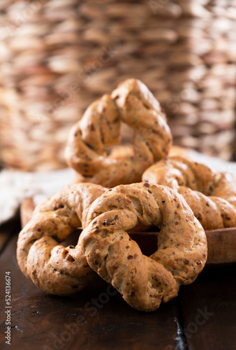 Taralli, a popular cheap snack, for sale in Naples, Italy. Neapolitan cookies called made with lard almond or black pepper. Vertical view, for social networks and advertising