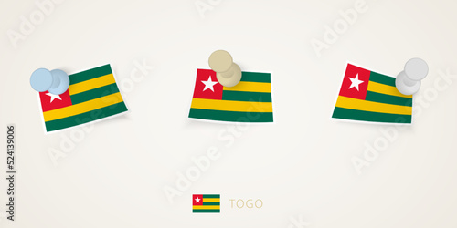 Pinned flag of Togo in different shapes with twisted corners. Vector pushpins top view.