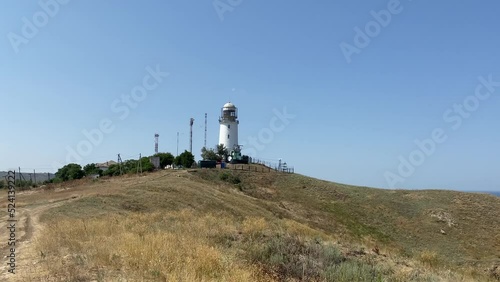 Landscape with a view of the Yenikalsky lighthouse. Kerch, Crimea photo