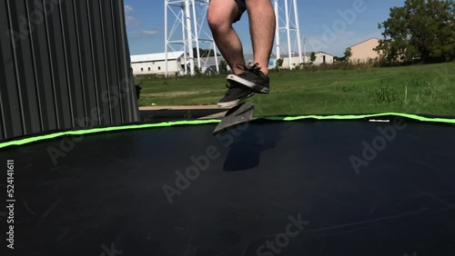 Kickflip Body Varial Trampoline Skateboarding Extreme Slow Motion photo