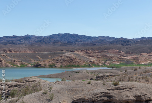 Climate change causing severe drought reveals receding beach and shoreline within Lake Mead in American desert southwest August 2022