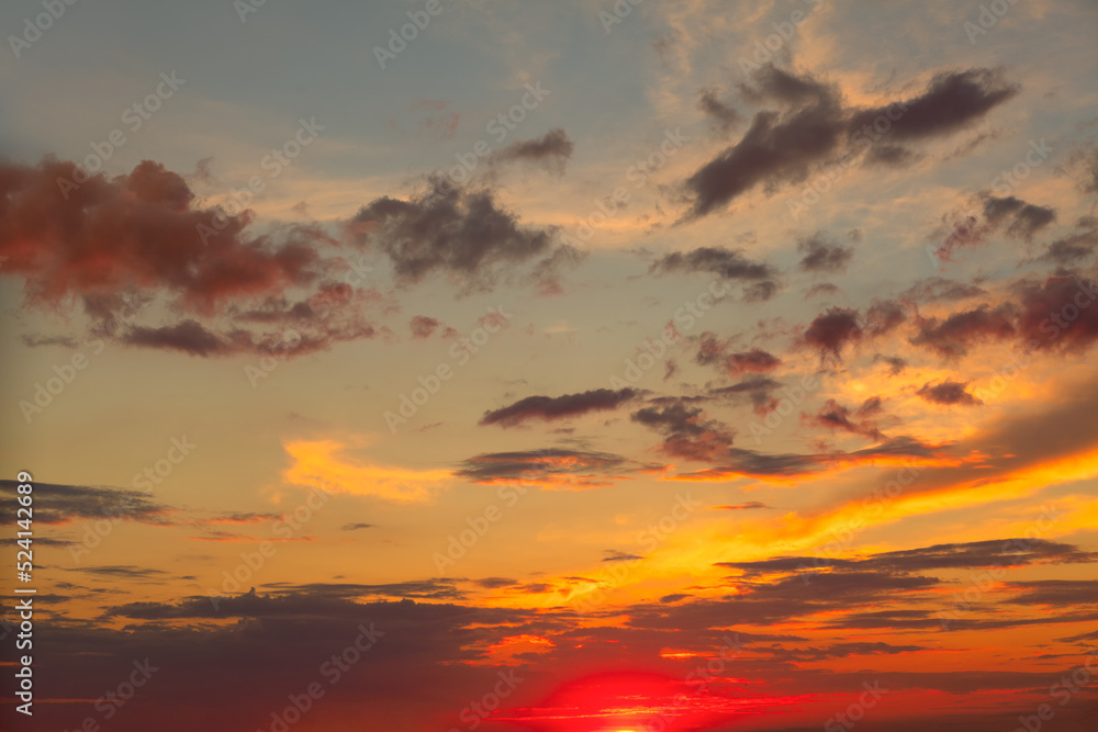 Rich colors sky with colorful clouds . Celestial twilight 