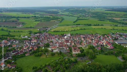 Aerial view of the village Neuhof an der Zenn in Germany, Bavaria on a sunny summer day.  photo