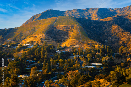 View of houses and hills in Hollywood from Canyon Lake Drive in Los Angeles, California.