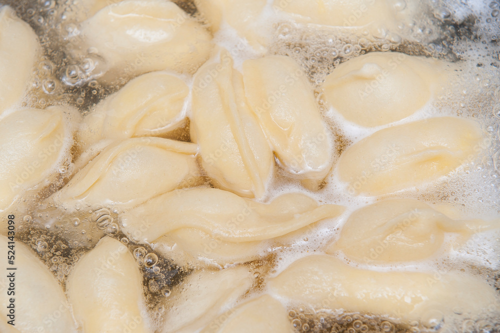 Top view of dumplings boiling
Top view of dumplings boiling