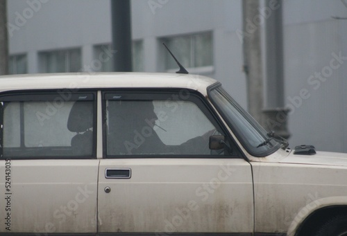 man smoking in the car