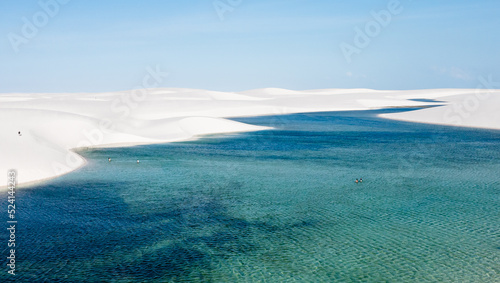aerial view of the white sand dunes of Lencois Maranhenses with rain water pools photo