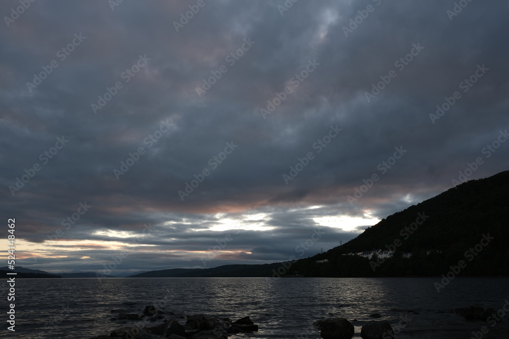 Twilight Reflections: Loch Rannoch's Breathtaking Serenity during the Scottish Sunset