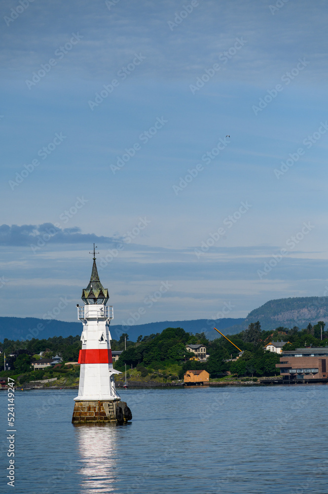 Beautiful lighthouse shaped navigation aid in the Oslo Fjord, Norway
