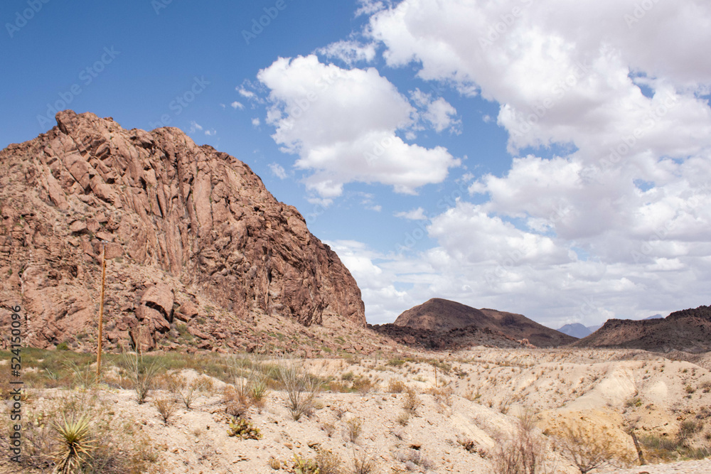 red rocks and sky in the desert with clouds and deep view red rocks and sky in the desert with clouds and deep view