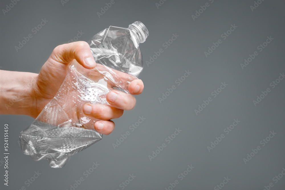 Crumpled bottle pet plastic resize or zero waste plastic hand recycling