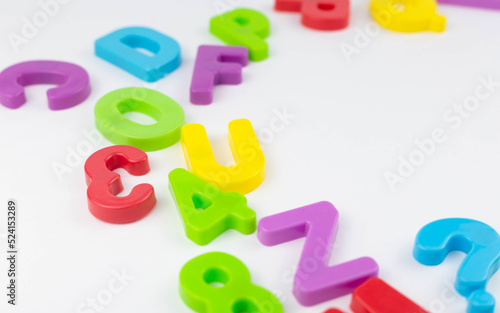 Colorful letters on a white background. Game. Education. Preschool
